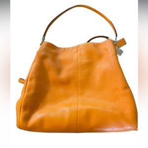 Authentic Coach, Madison purse in Orange.